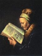 Portrait of an old woman reading
